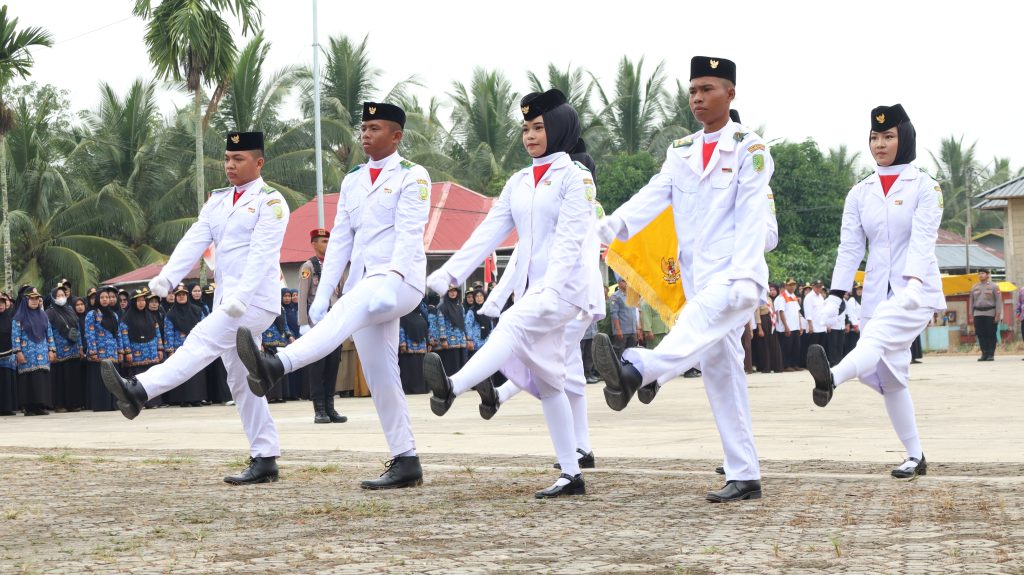 Bertindak sebagai Inspektur Upacara, Dr. Muriadi, S.I.Kom., M.AP., M.M.G. Brigadir Polisi Alrasid dipercaya sebagai Komandan Upacara